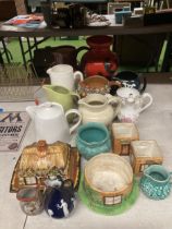 A MIXED GROUP OF CERAMIC JUGS AND FURTHER CERAMICS, COTTAGE BUTTER DISH ETC