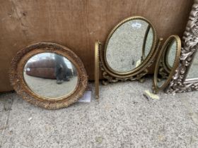 A MODERN GILT TRIPLE DRESSING MIRROR AND 21" DIAMETER GILT WALL MIRROR