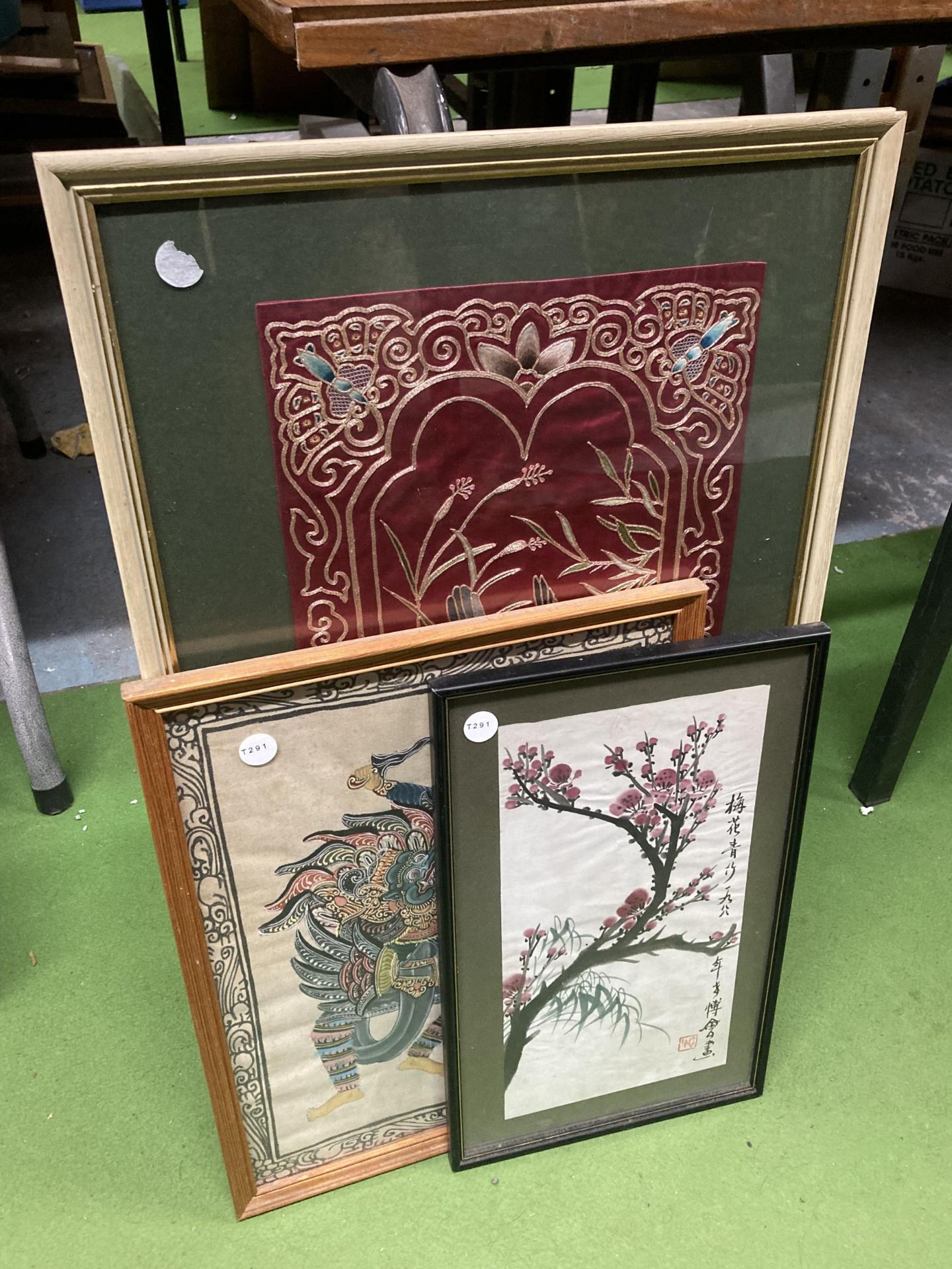 THREE ORIENTAL FRAMED PICTURES - SILK BIRD SCENE, FABRIC PAINTED INDIAN PICTURE ETC
