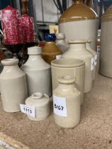 A QUANTITY OF VINTAGE STONEWARE BOTTLES TO INCLUDE LARGE FLAGONS - 11 IN TOTAL