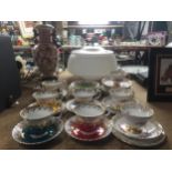 A GROUP ROYAL ALBERT REGAL SERIES CUPS AND SAUCERS TOGETHER WITH REGENCY EXAMPLES