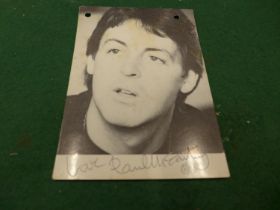 A PAUL MCCARTNEY SIGNED POSTCARD