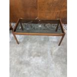 A MYER RETRO TEAK COFFEE TABLE WITH INSET SMOKED GLASS TOP, 35 X 18"