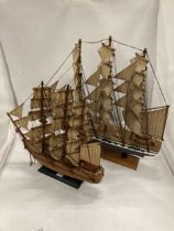 TWO WOODEN MODELS OF SAILING SHIPS, HEIGHTS 45CM AND 35CM, LENGTHS 51CM AND 35CM