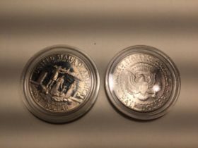 TWO HALF DOLLARS TO INCLUDE A 1986 LIBERTY AND A TITANIC