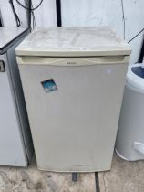 A WHITE PROLINE UNDERCOUNTER FRIDGE