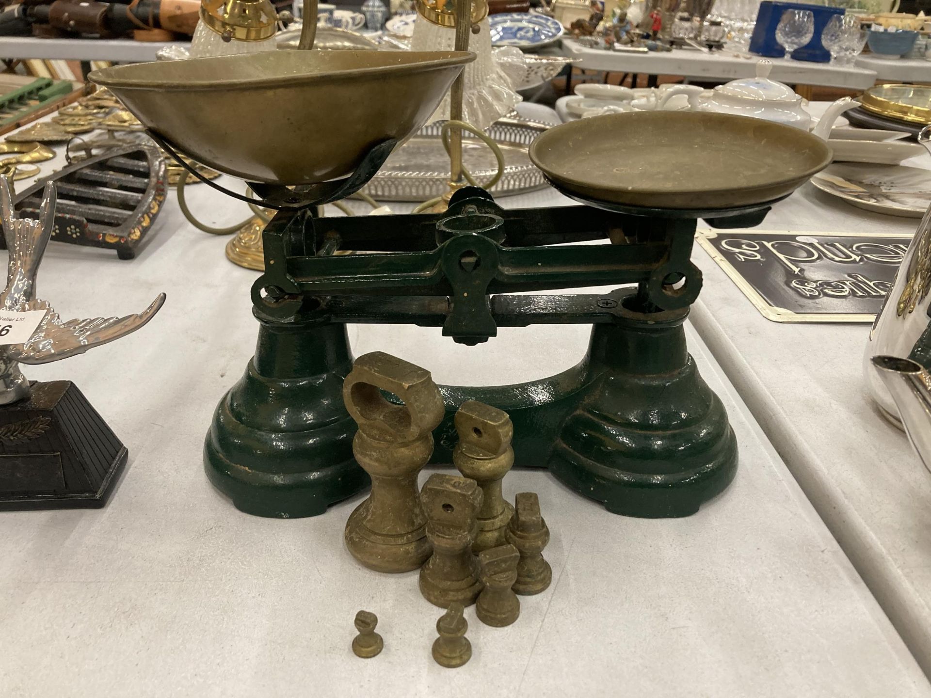A SET OF SMALL VINTAGE LIBRASCO SCALES WITH BRASS PANS AND WEIGHTS