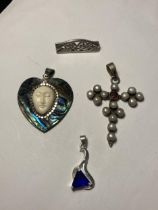 FOUR ITEMS TO INCLUDE THREE SILVER PENDANTS AND A SILVER BROOCH