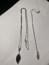 TWO SILVER NECKLACES WITH PENDANTS