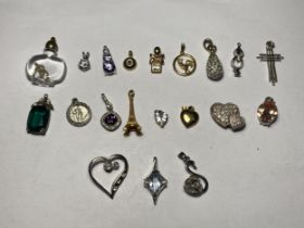 TWENTY VARIOUS PENDANTS