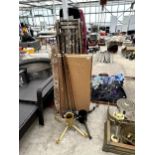 AN ASSORTMENT OF ITEMS TO INCLUDE TWO CHRISTMAS TREE STANDS, GOLF CLUBS AND PASTING TABLES ETC