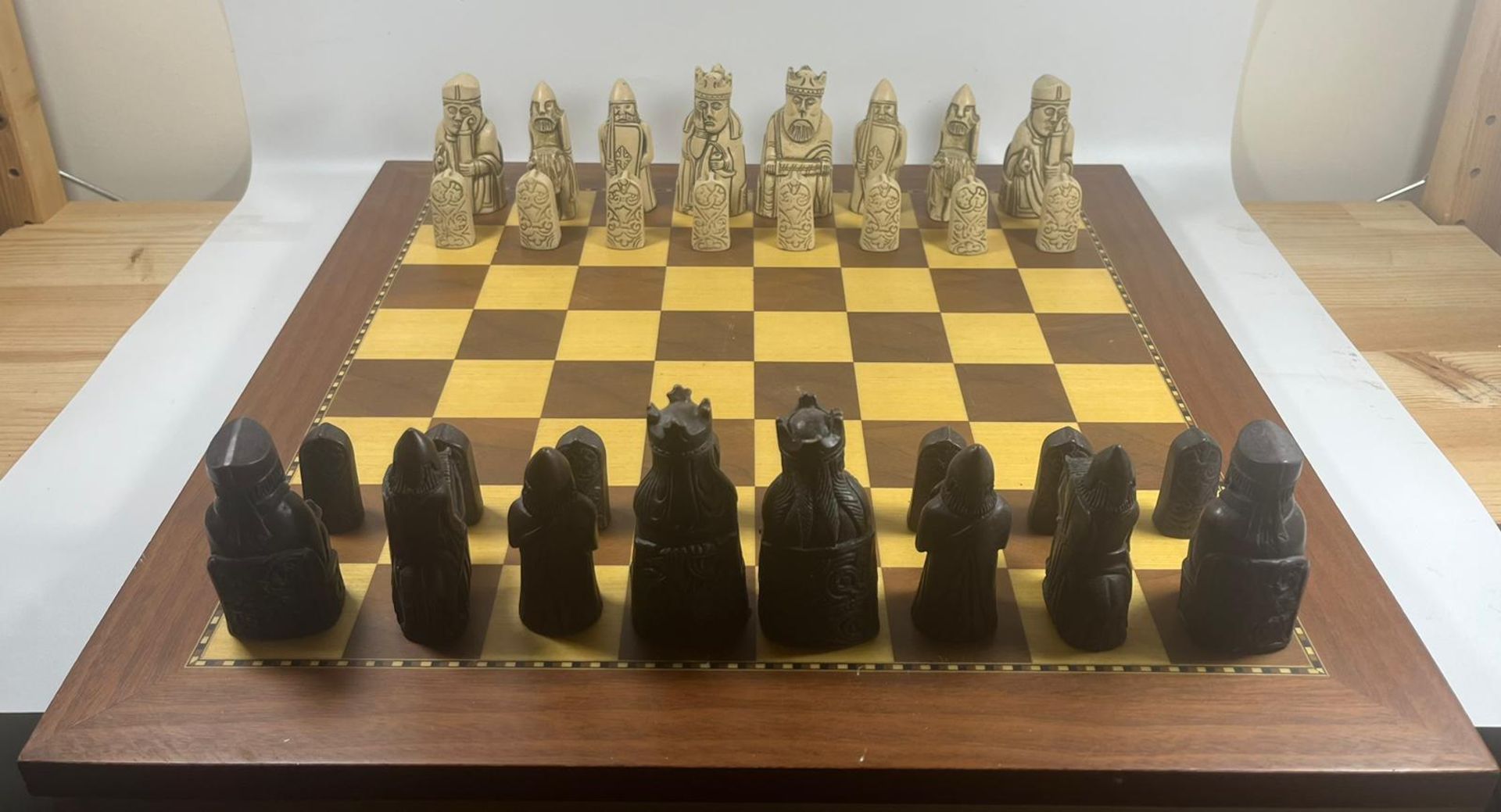 A VINTAGE LEWIS CHESSMEN CHESS SET MODELLED AS MEDIEVAL FIGURES ON AN INLAID WOODEN BOARD, KING - Image 5 of 5