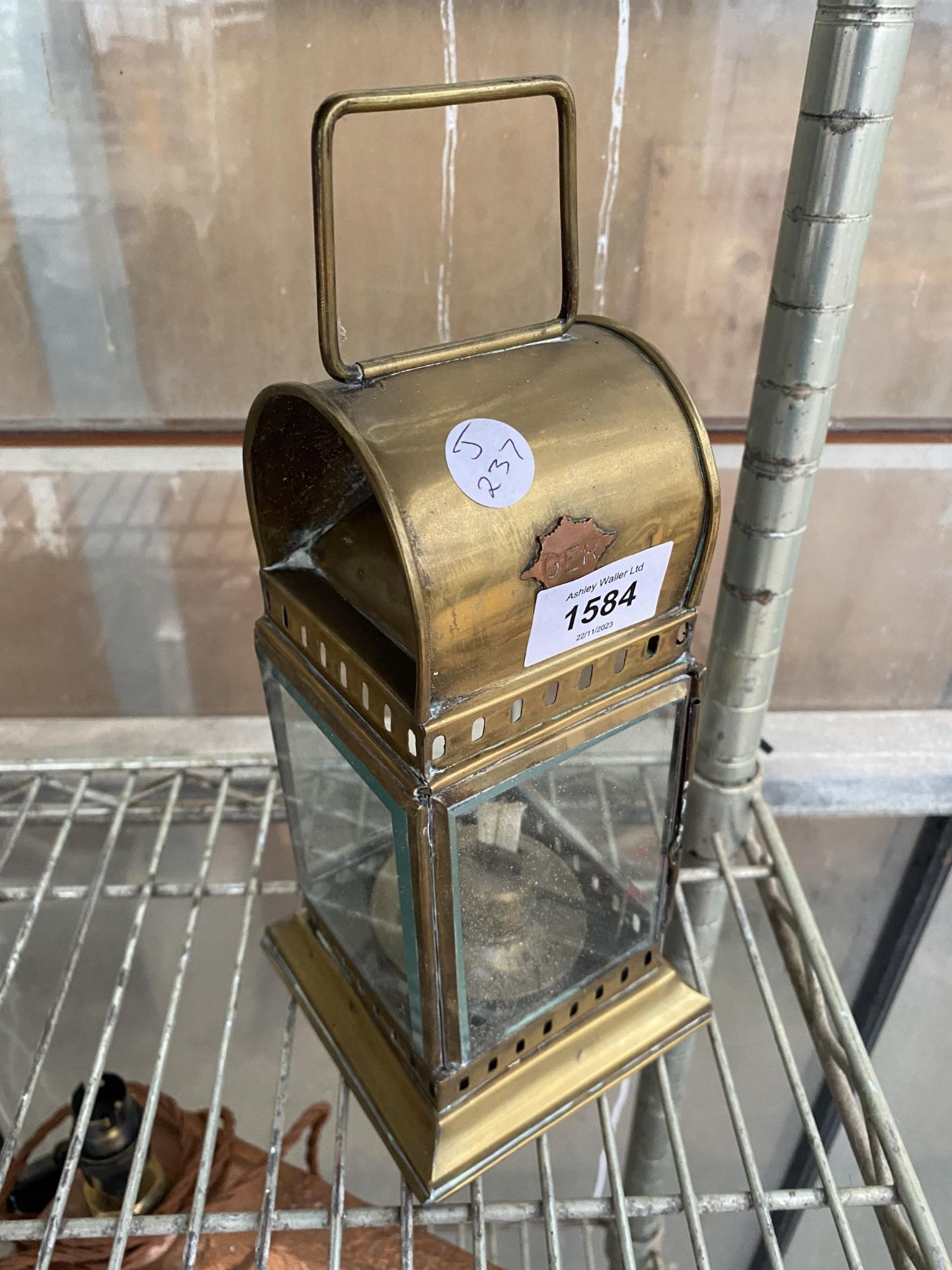 A VINTAGE BRASS OIL LANTERN