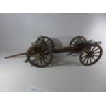 A MODEL OF A NAPOLEONIC WAR CANON AND TENDER, LENGTH 70CM