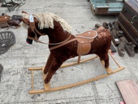 A CHILDS ROCKING HORSE