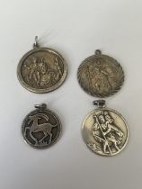 A BAG OF SILVER ST CHRISTOPHERS