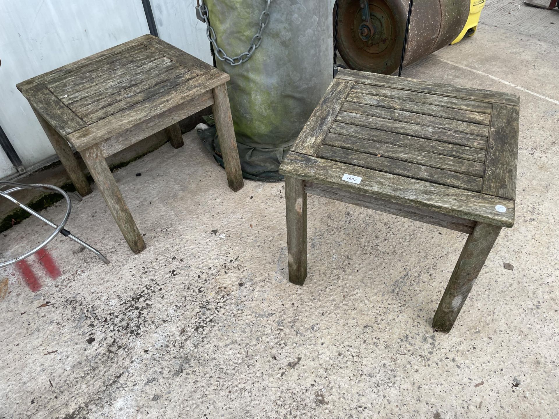 A PAIR OF WOODEN GARDEN SIDE TABLES