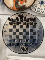 A AFRICAN DESIGN CHESS SET AND BOARD