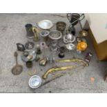 AN ASSORTMENT OF METAL WARE ITEMS TO INCLUDE A BRASS DUCK, TROPHIES AND CANDLESTICKS ETC