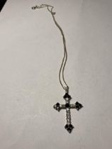 ONE SILVER NECKLACE WITH CROSS PENDANT