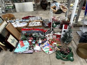 A LARGE ASSORTMENT OF CHRISTMAS ITEMS AN DECORATIONS TO INCLUDE SIGNS, TREES AND TREE STANDS ETC