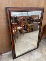 A MODERN WOODEN FRAMED WALL MIRROR, 41 X 29"