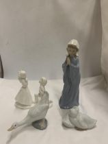 A GROUP OF FOUR FIGURES - NAO LLADRO GIRL AND GEESE AND A ROYAL DOULTON IMAGES FIGURE