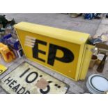 A LARGE DOUBLE SIDED ILLUMINATED 'EP' (EUROPEAN PETROL) LIGHT BOX SIGN