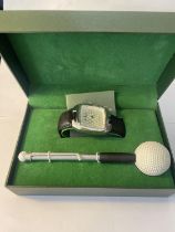 AN AS NEW AND BOXED GOLF THEMED BIRDIE WATCH AND PEN SET SEEN WORKING BUT NO WARRANTY