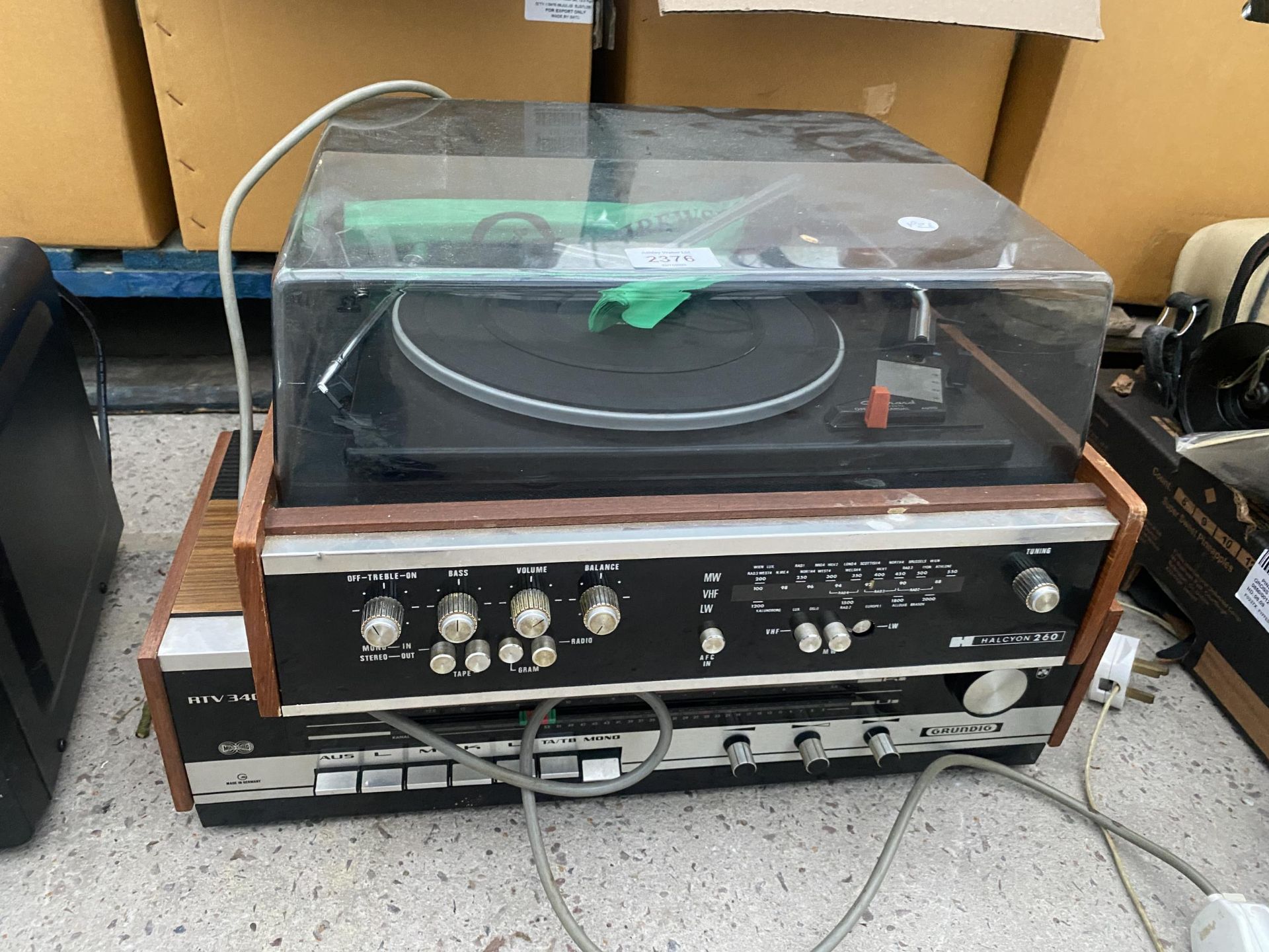 A GRUNDIG STEREO SYSTEM AND A HALCYON 260 RECORD PLAYER