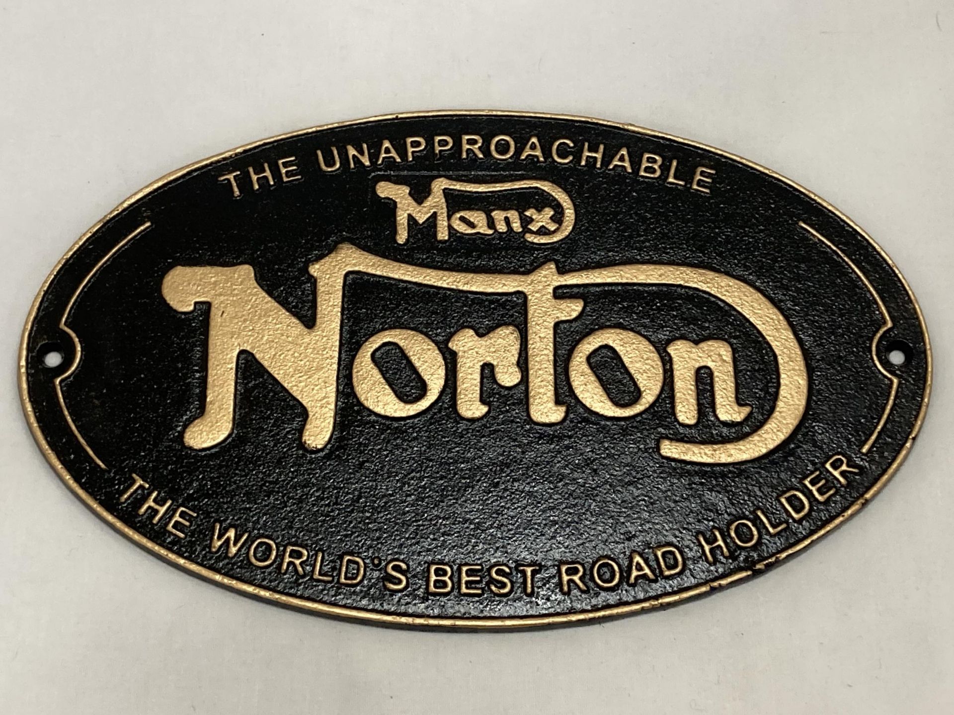 A CAST NORTON SIGN, 33CM X 20CM