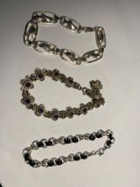 THREE VARIOUS SILVER BRACELETS