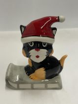 A LORNA BAILEY HAND PAINTED AND SIGNED CAT ON A SLEDGE