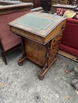 A VICTORIAN WALNUT DAVENPORT WITH FOUR SIDE DRAWERS, FOUR SHAM DRAWERS AND BRASS GALLERY