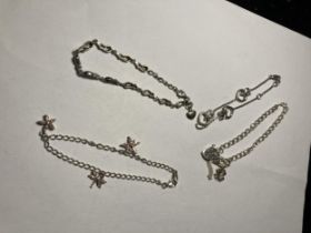 FOUR ASSORTED SILVER BRACELETS