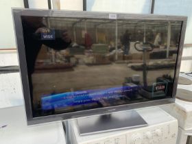 A PANASONIC VIERA 37" LCD TELEVISION MODEL TX-L37ET5B COMPLETE WITH REMOTE CONTROL BELIEVED IN