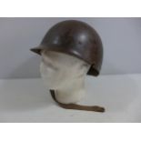 A MILITARY HELMET AND LINER
