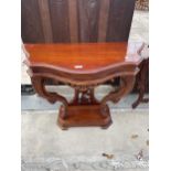 A VICTORIAN STYLE CONSOLE TABLE WITH CARVED BACK PANEL AND LEGS, 38" WIDE