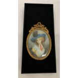AN ANTIQUE (APPROX 1870) GILT FRAMED PORTRAIT MINIATURE OF A LADY, LABEL TO REVERSE, LENGTH 11CM