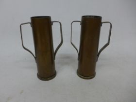 A PAIR OF WORLD WAR II TRENCH ART VASES MADE FROM SHELL CASES, ONE DATED 1943, HEIGHT 43CM