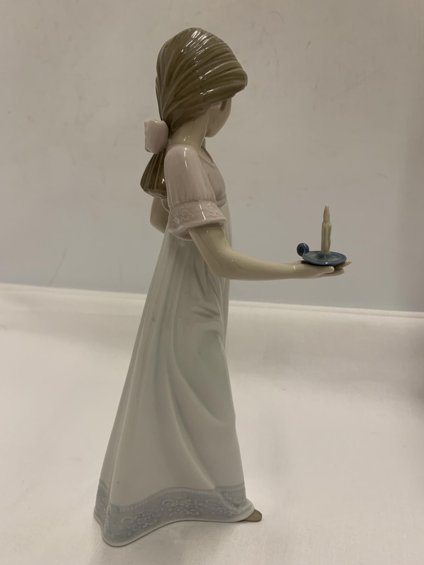 A NAO FIGURE OF A GIRL HOLDING A CANDLE - Image 4 of 5