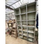 AN 18 SECTION METAL PIGEON HOLE STORAGE UNIT