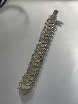 A SILVER COIN BRACELET