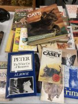 A LARGE QUANTITY OF HARDBACK BOOKS ABOUT CATS - 25 IN TOTAL