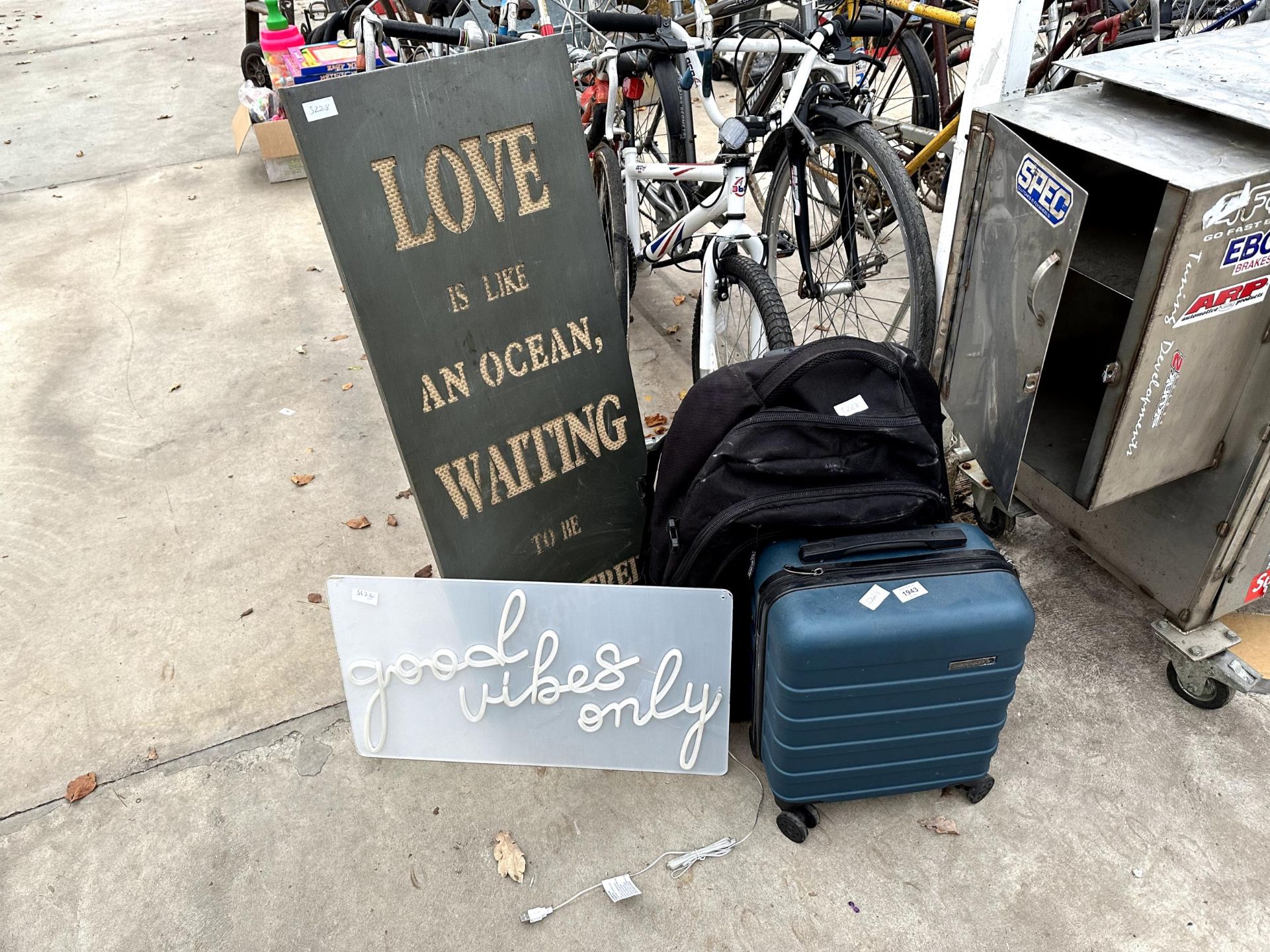 AN ASSORTMENT OF ITEMS TO INCLUDE SIGNS AND SUITCASES ETC