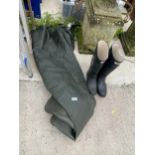 A PAIR OF BARBOUR WADERS AND A PAIR OF HUNTER WELLIES