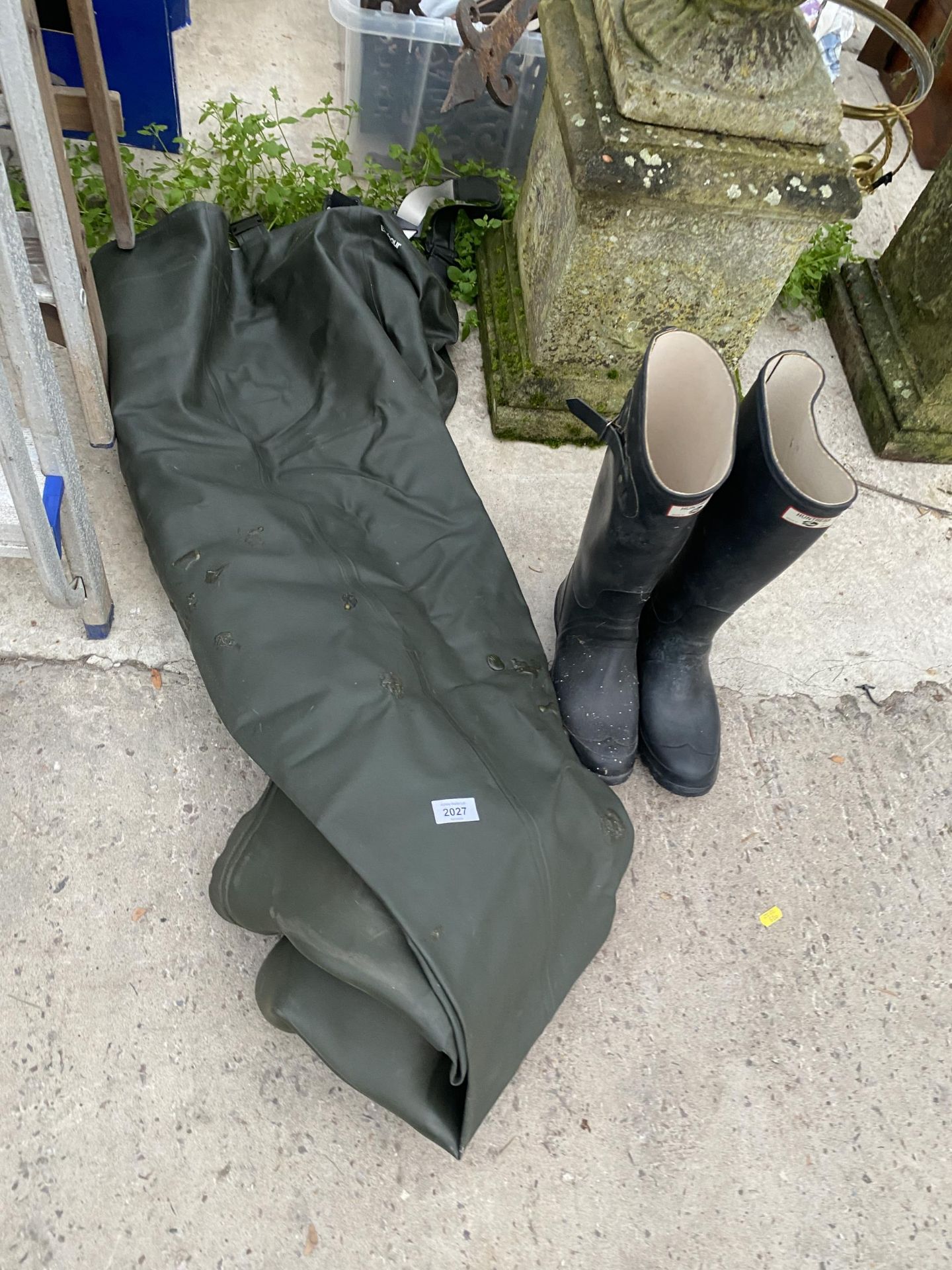 A PAIR OF BARBOUR WADERS AND A PAIR OF HUNTER WELLIES