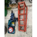 A SERT OF METAL CAR RAMPS, A BOTTLE JACK AND A DRILL ETC