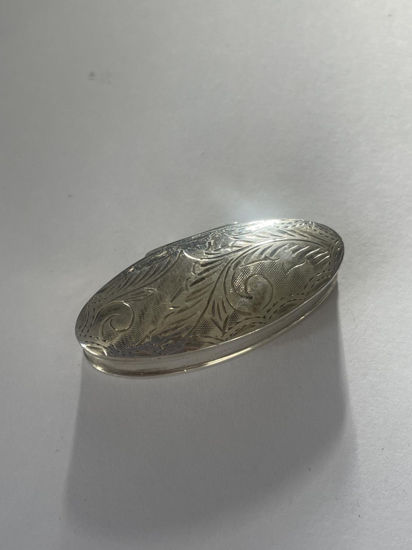 A SILVER PILL BOX