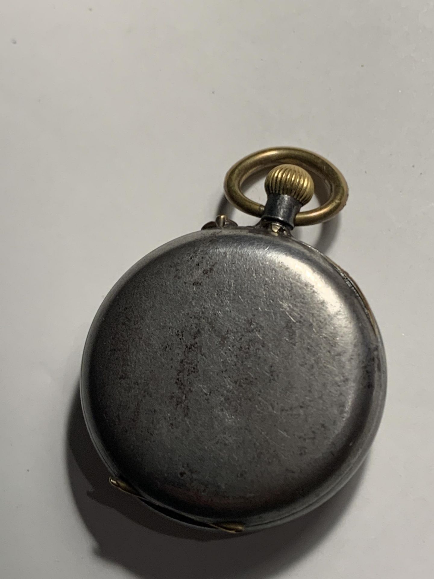 A LADIES RED CROSS POCKET WATCH WITH WHITE ENAMEL FACE AND ROMAN NUMERALS SEEN WORKING BUT NO - Image 2 of 2